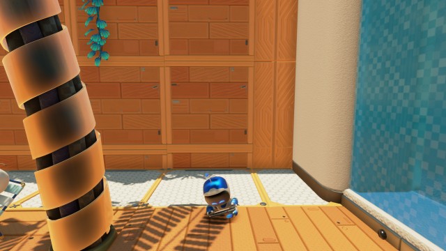 Screenshot: Astro ist langweilig und spielt auf einer PS Vita im Kühlungslevel. Wie alle seine Kameraden ist er extrem putzig animiert, auch wenn der Spieler eine Weile nichts tut.