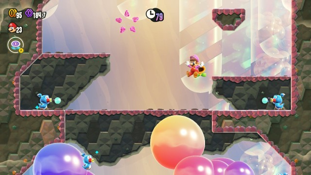Screenshot: Super Mario Bros. Wonder: Mario fällt, seine Mütze hebt sich leicht an