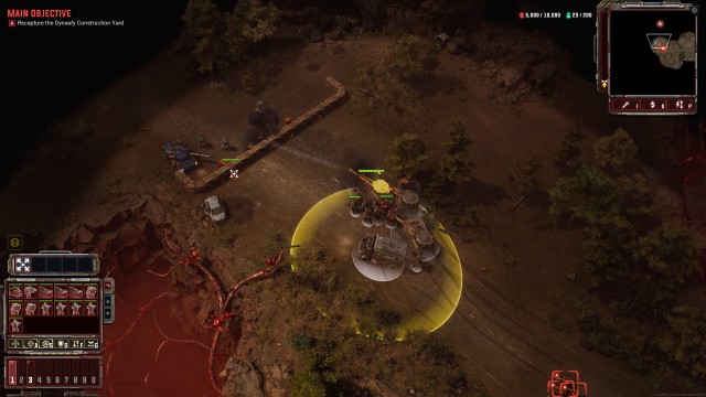 Screenshot: Spielszene aus Tempest Rising: Angriff auf einen Wall mit explosiven Fässern dahinter